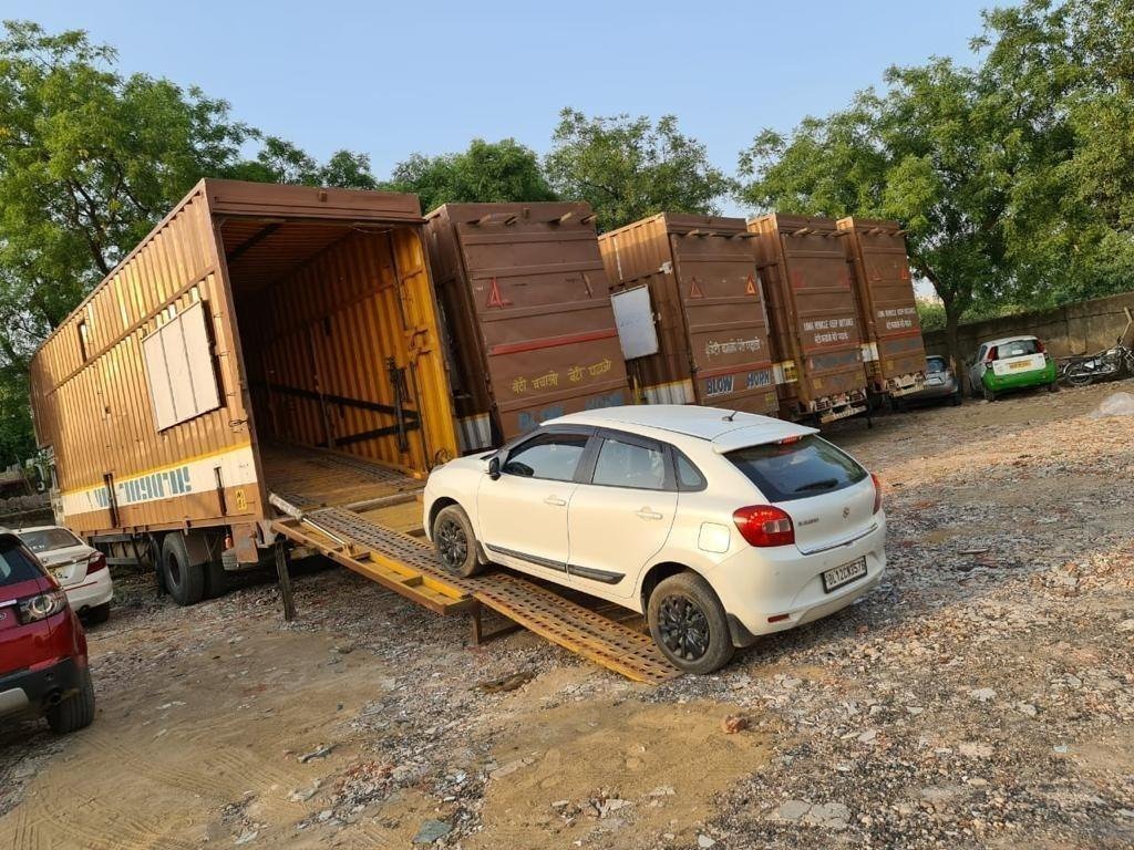 Car being loaded safely onto a vehicle carrier